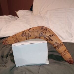 Artisan Carved Wooden Boomerang with Animal Motifs